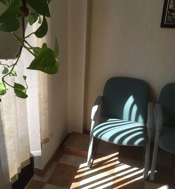 Daylight on a flat wall — Waiting area