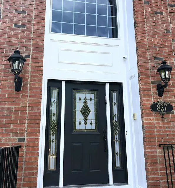 Doors, sidelights, and casing — Brick entry, white trim